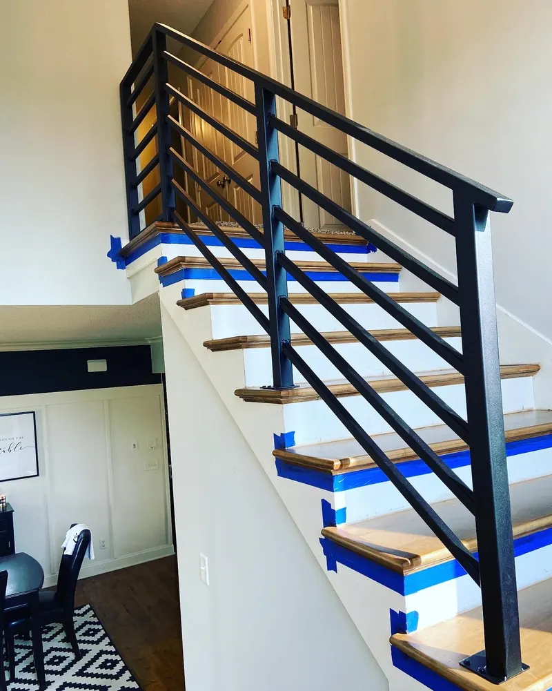 Interior stair railing install, welding job by KC Ironcore