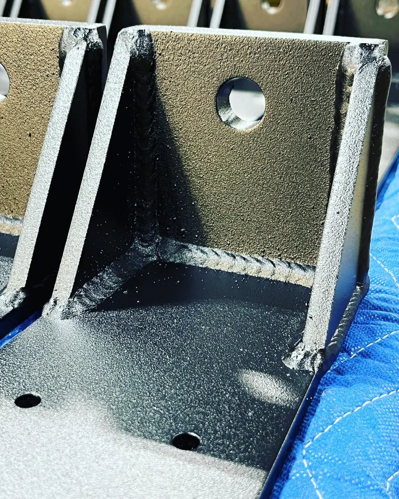 Powder-coated post brackets, welding job by KC Ironcore