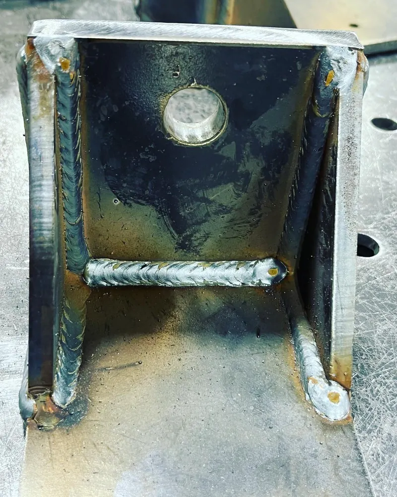 Welded bracket interior welds, welding job by KC Ironcore