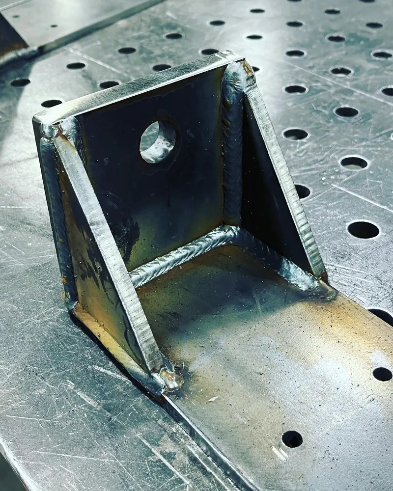 Gusseted steel mounting bracket, welding job by KC Ironcore