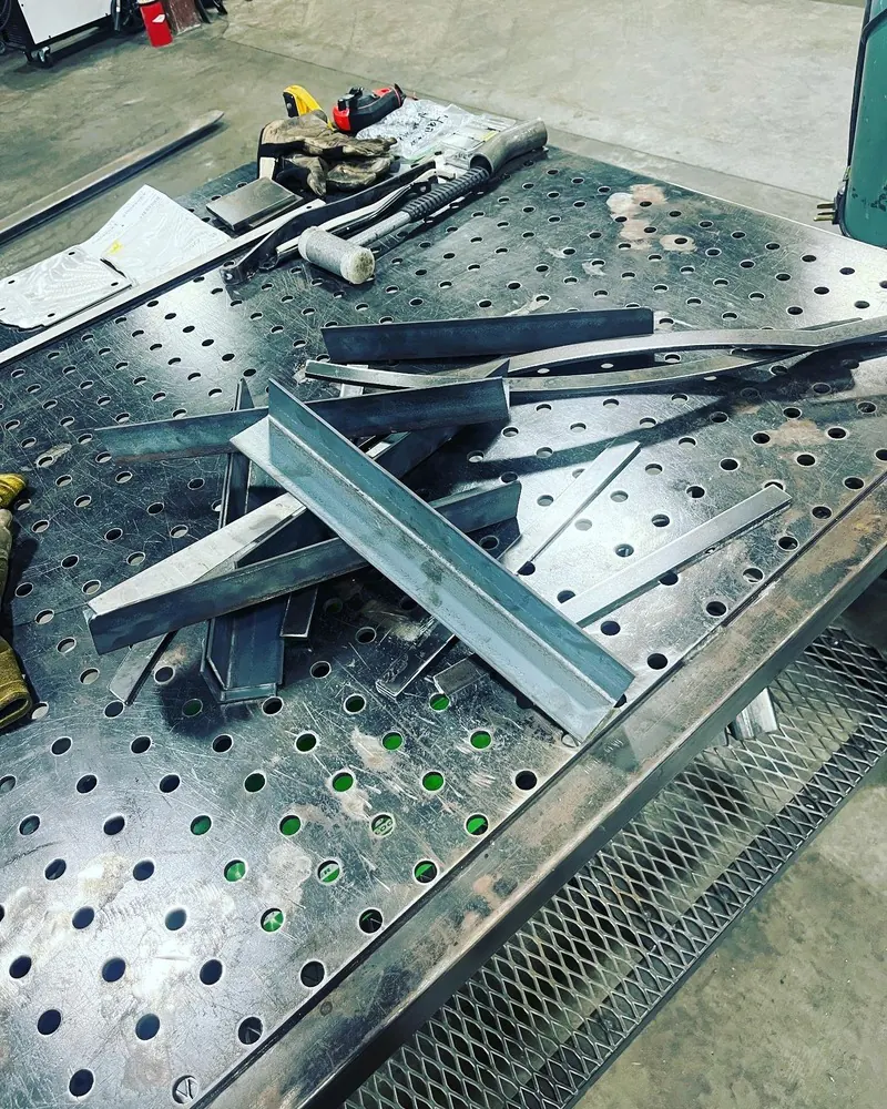 Cut steel angle parts, welding job by KC Ironcore